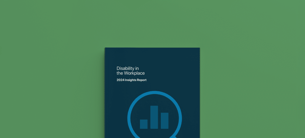Cover of a report titled “Disability in the Workplace: 2024 Insights Report.” The design is minimalist with a dark teal background, white text, and a circular icon featuring a bar chart in the center. The report rests on a solid green surface.