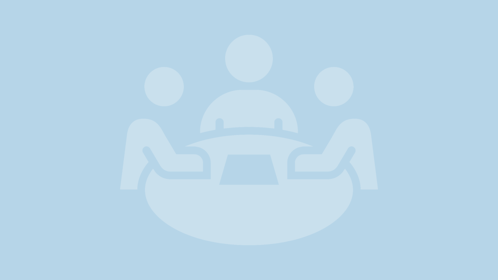 Cartoon of people sitting at roundtable