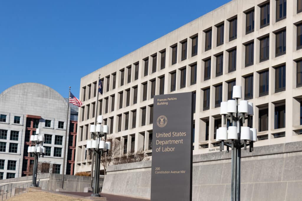 Sign on Constitution Avenue for the US Department of Labor HQ at the Frances Perkins Building in D.C.
