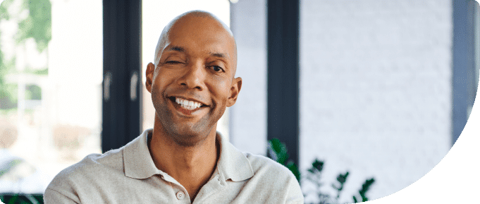 Smiling man with vision impairment