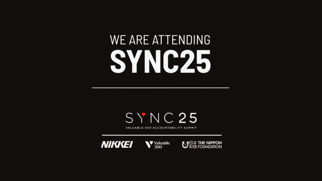 A digital graphic displaying the text 'We are attending SYNC25' in bold white capitalised font. Below is a logo that shows 'SYNC25 Valuable 500 Accountability Summit' with a line under it, and then there are three logos for Nikkei, Valuable 500, and The Nippon Foundation. The background is black.